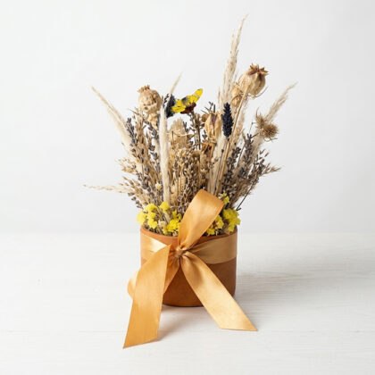 ARREGLO FLORERO AMARILLO COMPRIMIDO